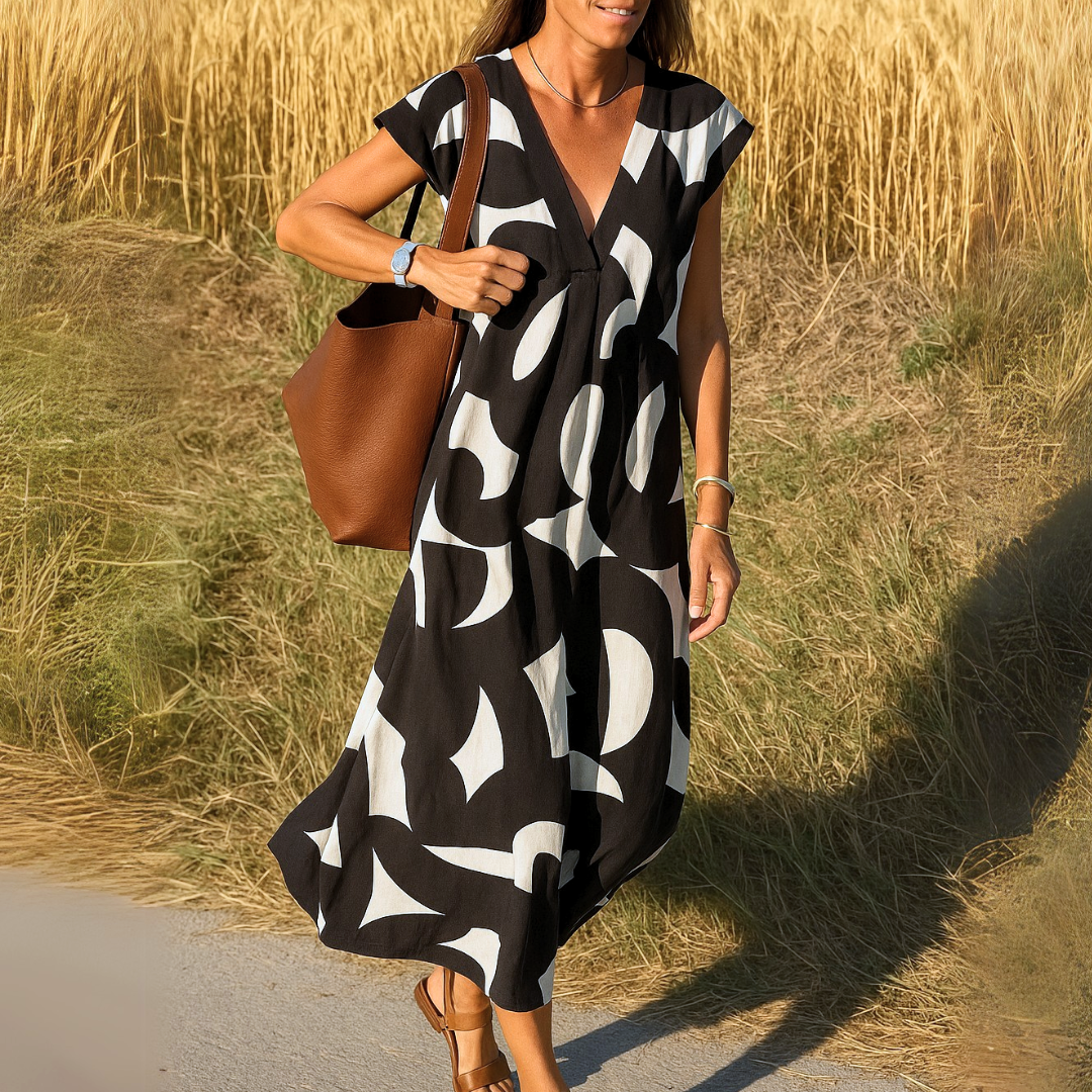 Robe Amina™ – Liberté estivale avec un imprimé graphique