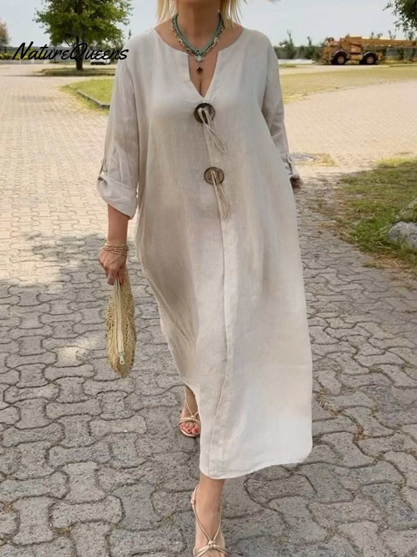 Noor – Robe longue avec détails en bois et manches amples